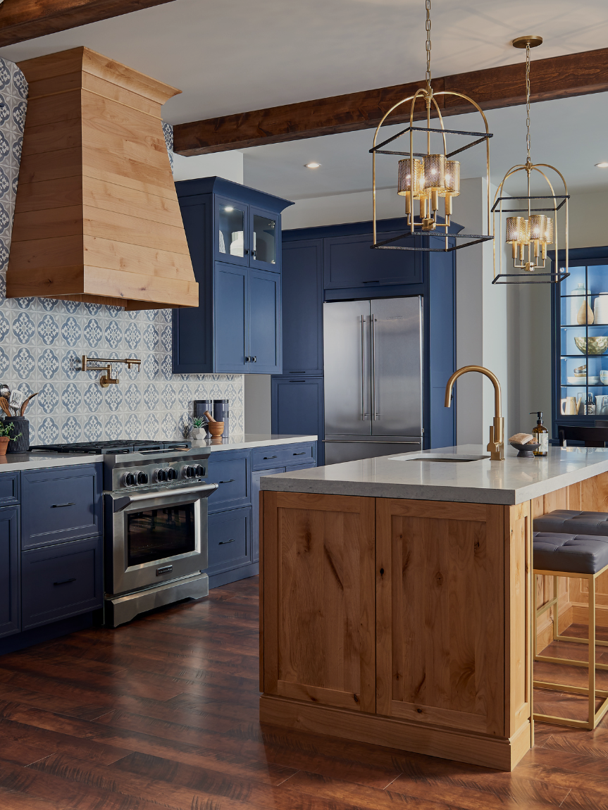 Kitchen scene with custom backsplash, cabinets, and countertops