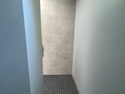 Bathroom remodel with tile wall